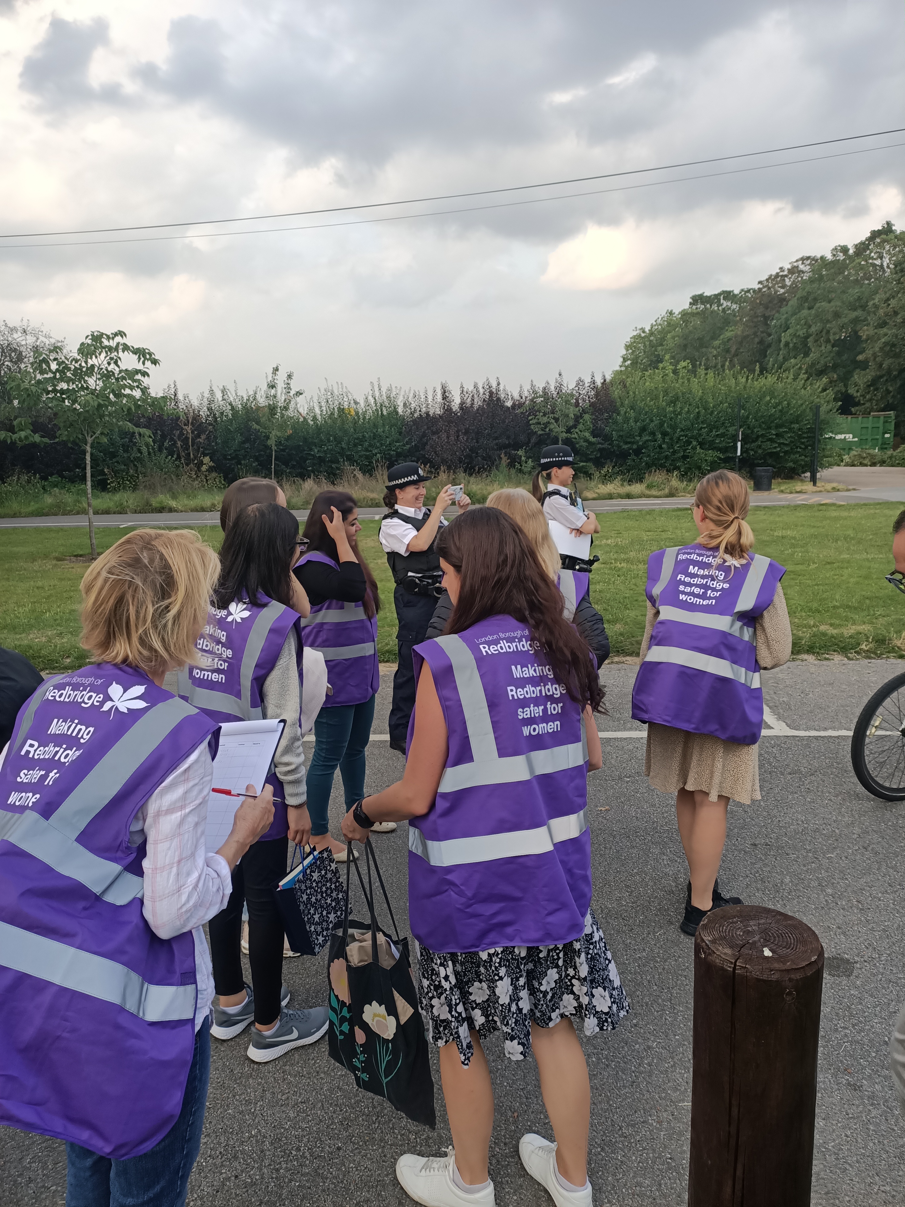 Women in purple vests saying 'making redbridge safe for women'