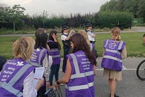 Women in purple vests saying 'making redbridge safe for women'