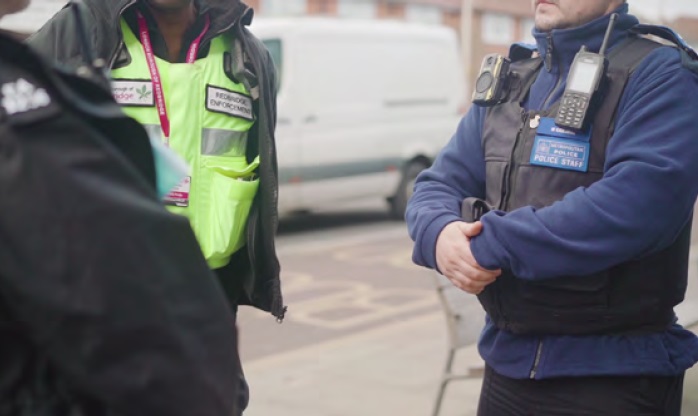Enforcement officers and police on the street 